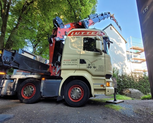 Lutter Spedition NRW - Betriebsumzüge - Maschinentransport - Logistik - Loading crane-at-construction services